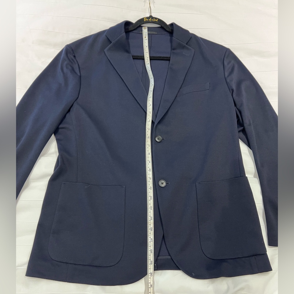 Uniqlo Navy soft suiting slim blazer. Back vent still stitched.men’s XL